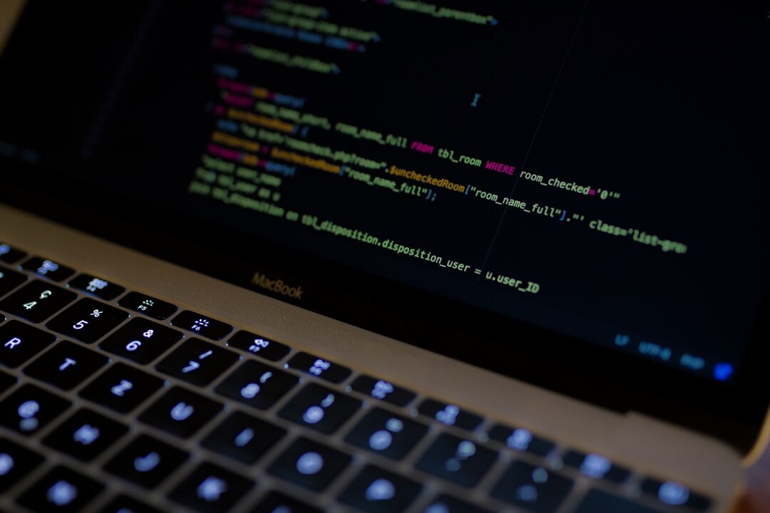 Laptop screen showing lines of code