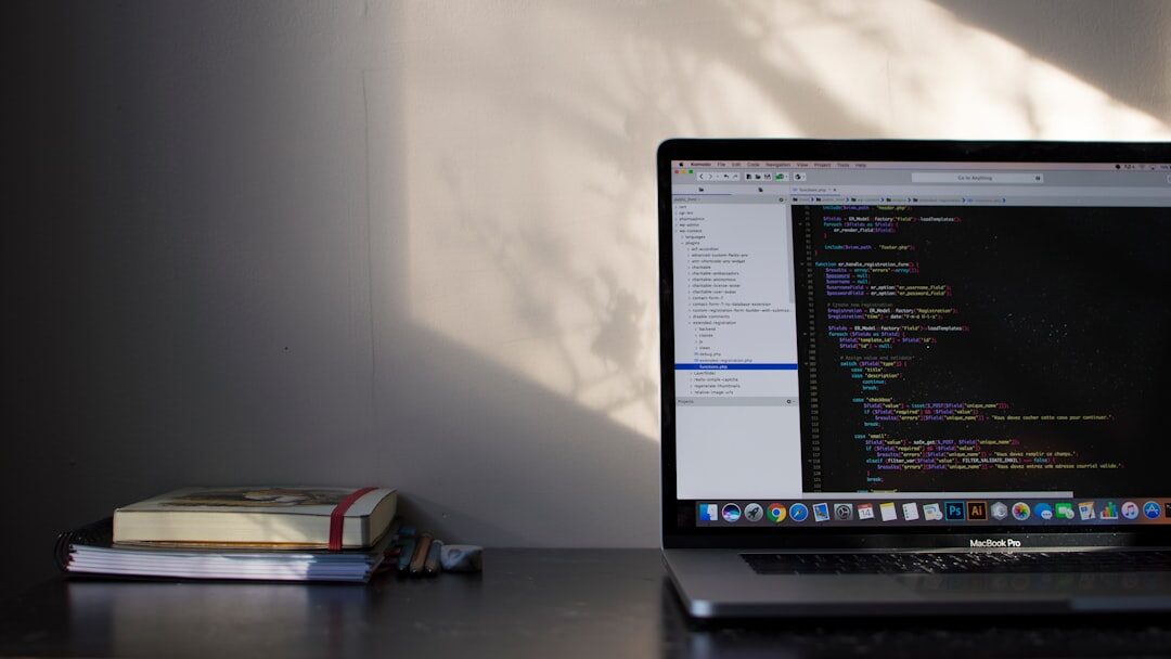 laptop with code on screen